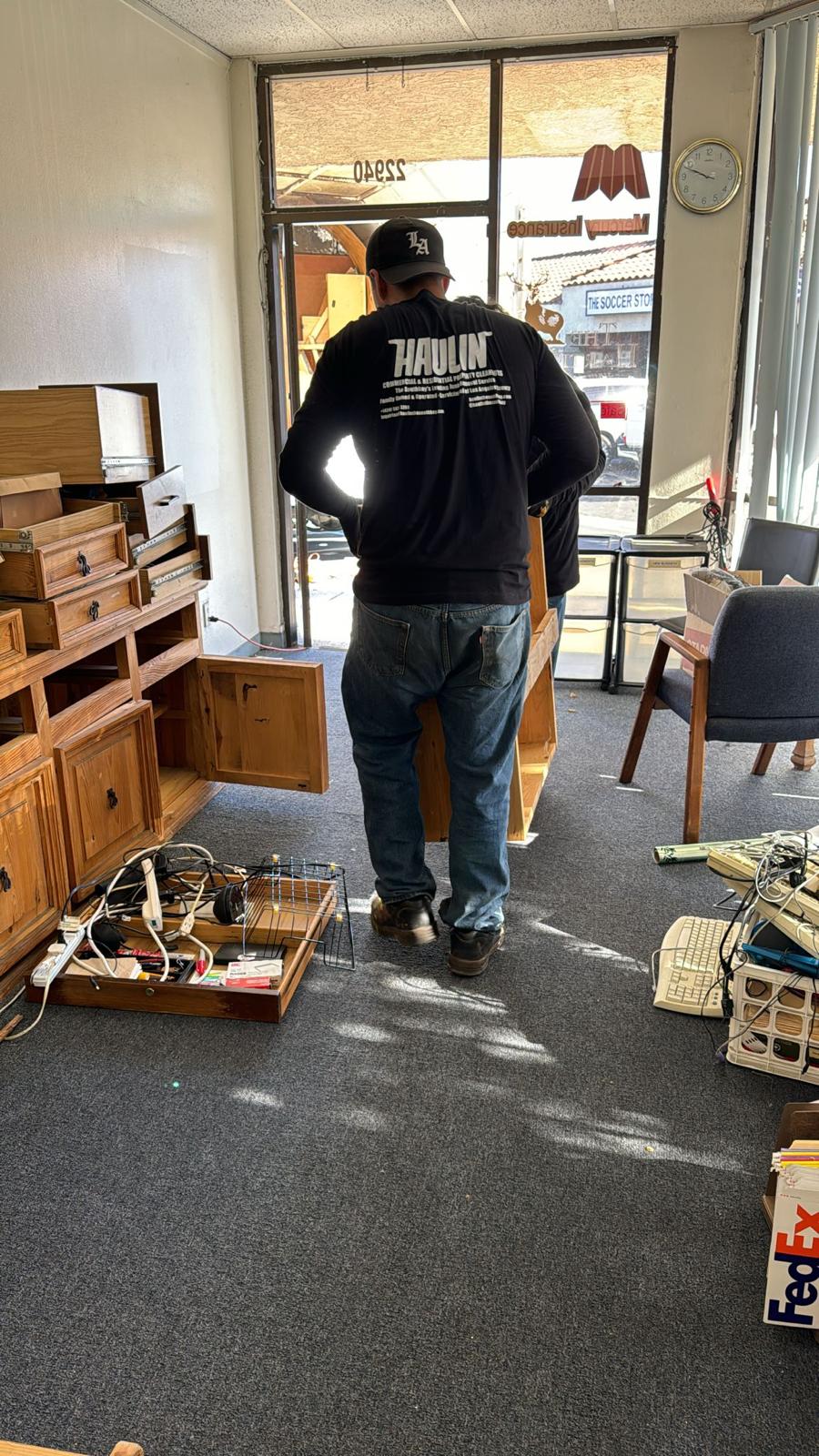 Pepe's Haulin crew clearing out office space